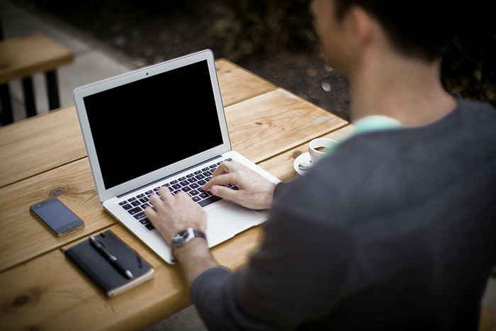 man at his laptop